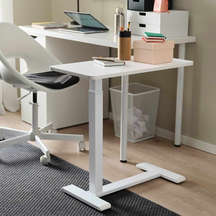 IKEA BOLLSIDAN laptop stand as a second desk beside a home office